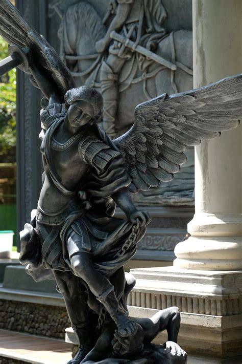 archangel michael statue depiction symbols