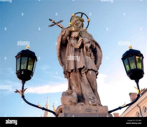 statues of Saint John of Nepomuk on bridges